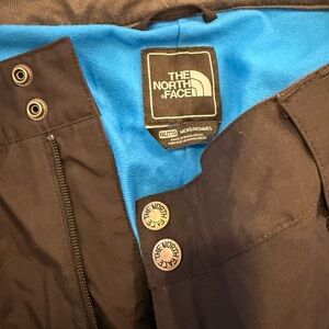 The North Face Black snowpants with Bright Blue Interior